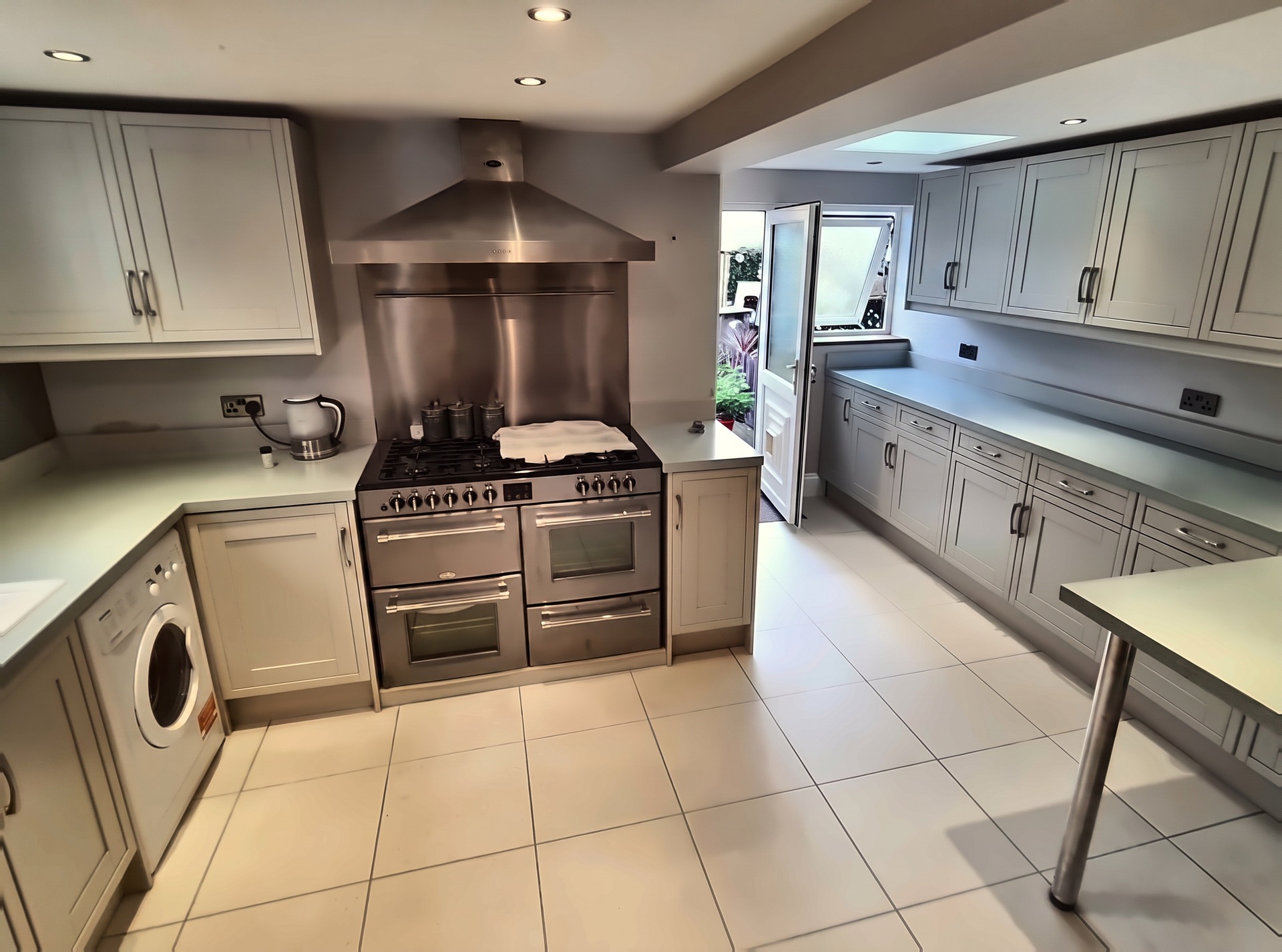 The same kitchen after a soft grey respray